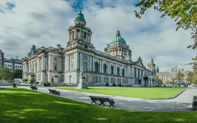Belfast City Hall with green domes and landscaped gardens – representing broadband in Belfast